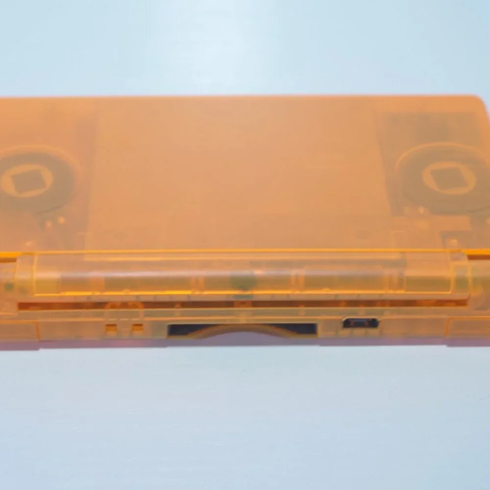 Nintendo DS Lite Transparent Clear Orange Handheld System with Charger & Stylus